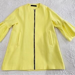 Ivanka Trump Yellow Cape with Modern A-Line Silhouette